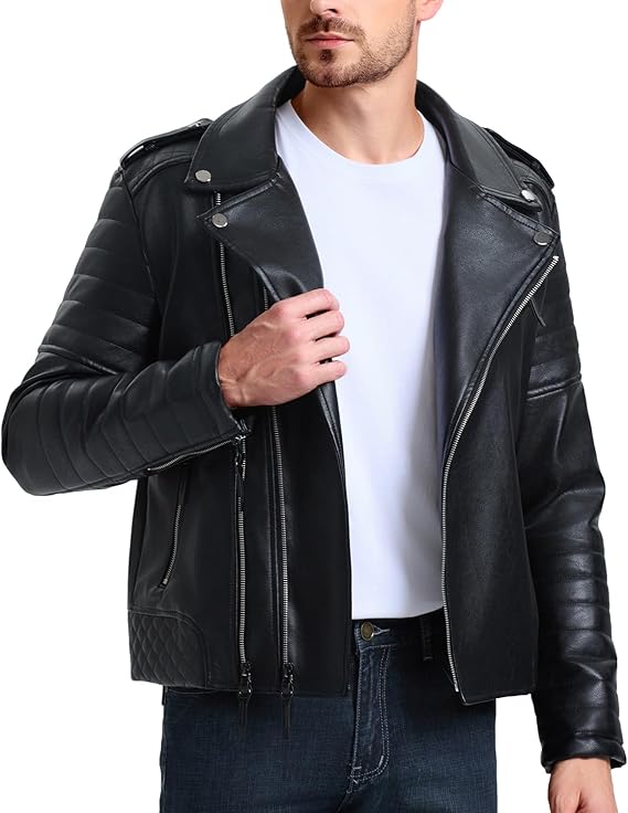 Man wearing a black leather jacket over a white shirt on a white background