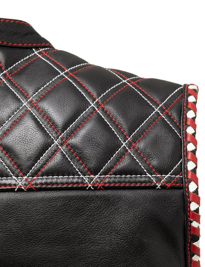 Close-up of a black leather product with red stitching and white accents on a white background