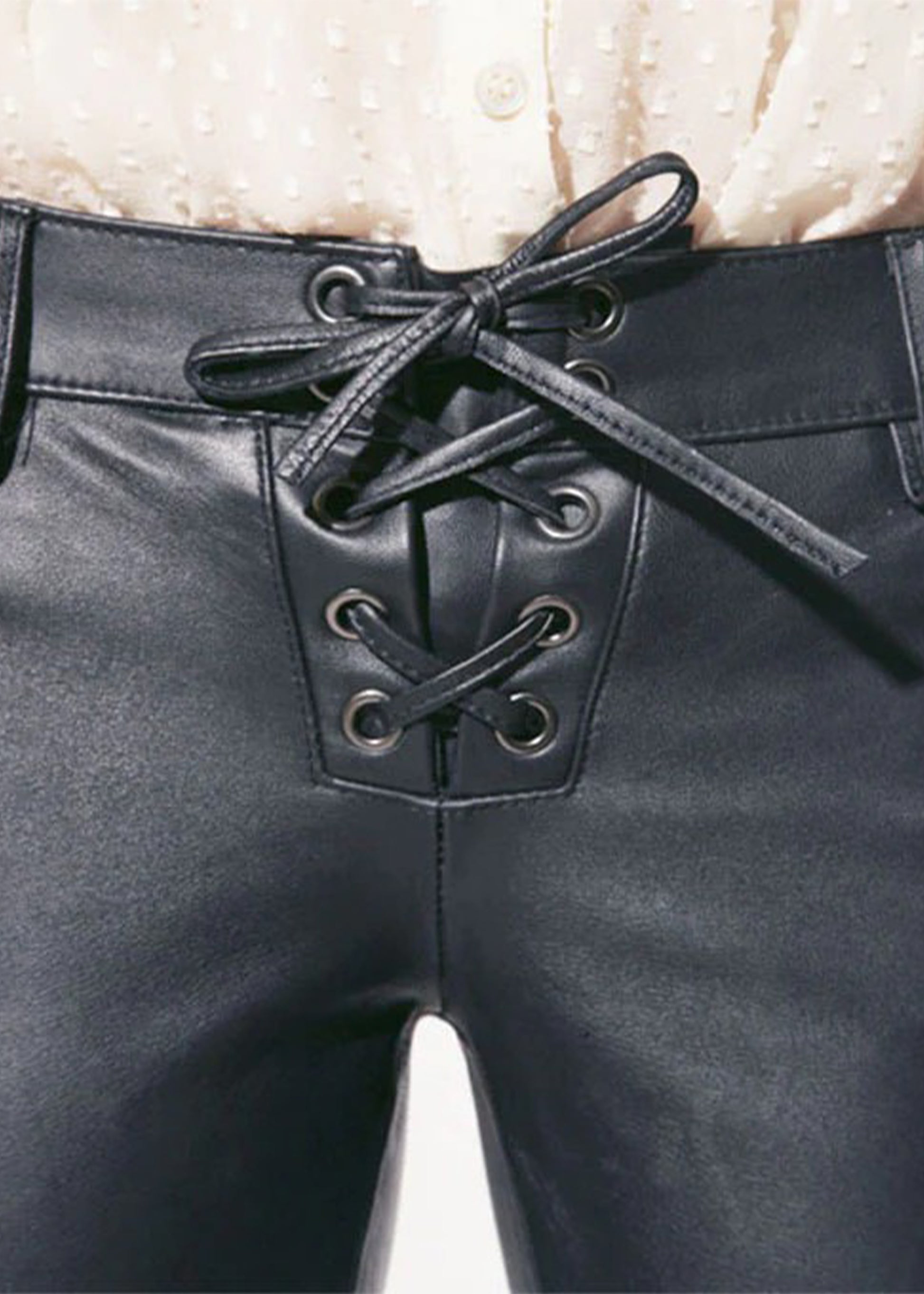 Black pants with lace-up front detail on a white background